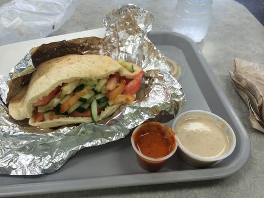 Fresh falafel pita with homemade hot sauce!