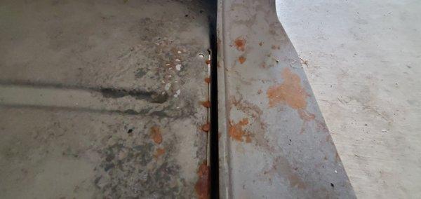 Passenger side rocker panels not lined up with floor and bad welds.