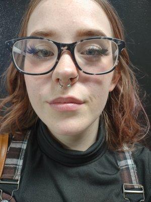 Here is a lovely septum piercing.