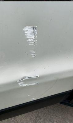 The gash on the door when I got it back that grandsport collision claim that Thompson Towing did it.