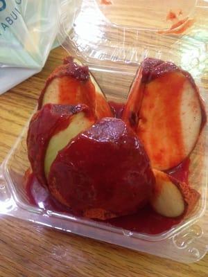 Tamarind covered apple with chamoy