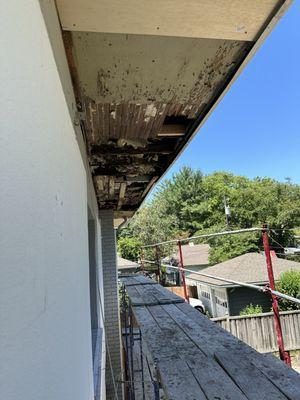 Three year old failed roof destroyed soffits and structure. Debris from rotten timber that had to be demolished.