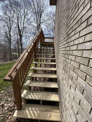 New stringers and stair boards installed