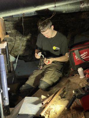 Trinity plumbing and drain cleaning repairing the plumbing in the crawlspace