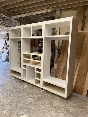 Hallway closet cabinets made of solid alder wood cabinet face frame and 3/4" plywood..