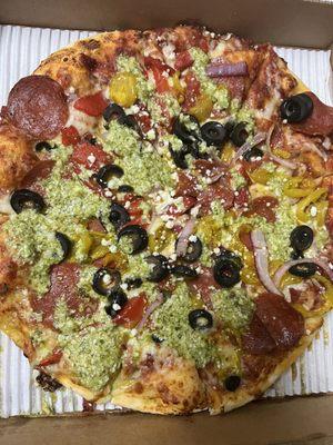 spicy marinara + inferno + pepperoni + black olive + roasted red pepper + sausage + banana pepper + red onion + pesto "drizzle"