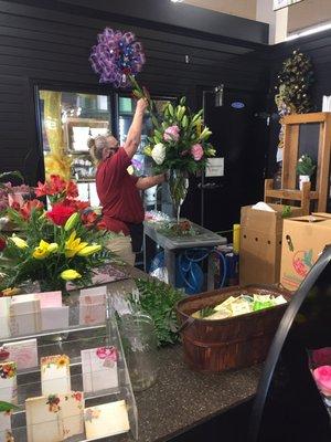 The wonderful lady at rouses market making the flowers