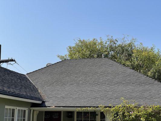 This is my 20+ year shingle roof one day after restoration.