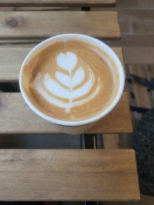 Beautiful latte art, slightly smudged cause I took a sip before the pic...