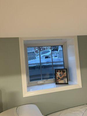 Basement egress window added and finished in a living space.