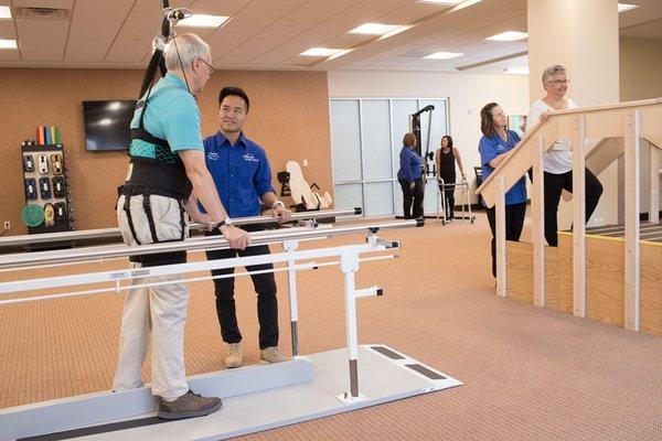 Therapy gym also features an occupational therapy suite where guests can re-learn how to cook, do laundry and use the bathroom safely.