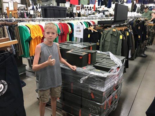 Bradley is having fun at the army surplus store!