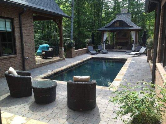 Flagstone pool coping and paver pool deck by Southern Pride Landscaping.