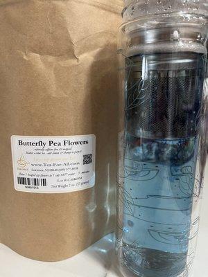 butterfly pea flowers, steeping in glass tea infuser bottle (also sold here)