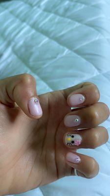 hello kitty gel manicure w/ rhinestones ; $45