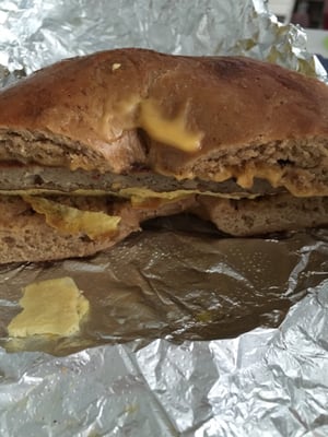 Sausage egg and cheese on a whole wheat bagel