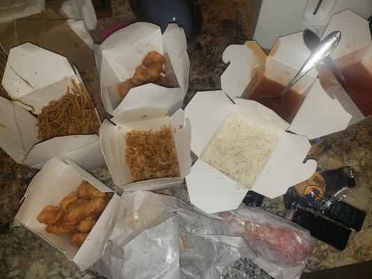 Beef Lomein, orange chicken, sweet and sour chicken, fried and white rice, cream cheese wontons, and egg rolls.