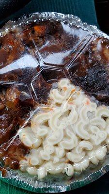 Bowl FULL!! Oxtail and white rice with macaroni salad.