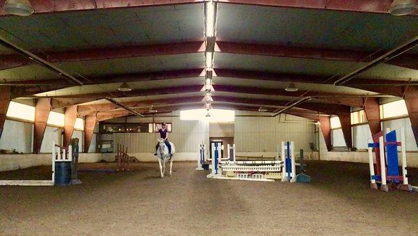 Heated indoor arena with full jump course.