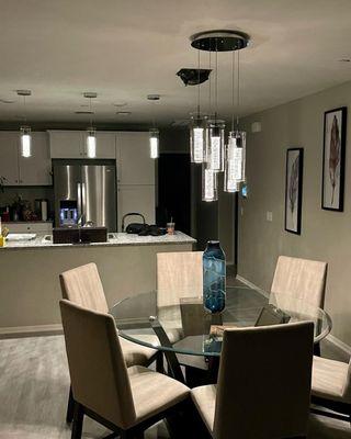 Custom light over dining table and kitchen island