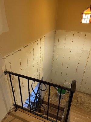 Skim coat drywall