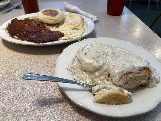 Biscuits with gravy and corned beef hash with eggs