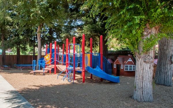 Our challenging playground encourages development of gross motor skills.