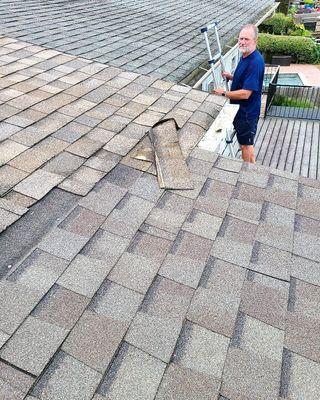 Loose shingles leave your home exposed to water damage. Call for your inspection and shingle roof repairs!