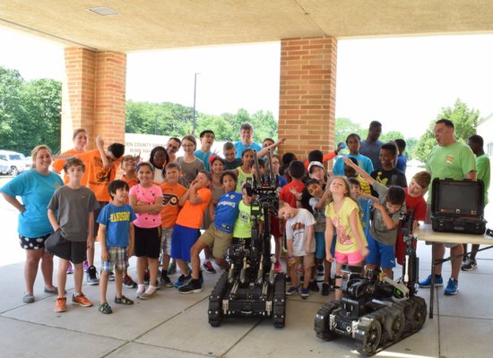 Wow Science Campers Celebrate After a Robotics Session