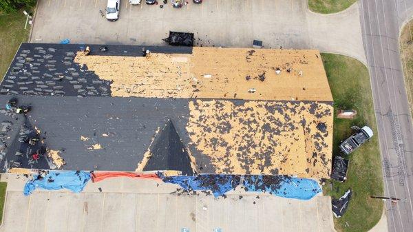 Tear off existing roof to the deck.