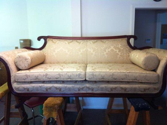 Custom rebuilt and reupholstered antique couch