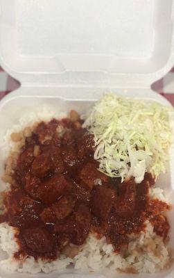 Morisqueta (white rice, beans and pork pieces cooked in a chili sauce)