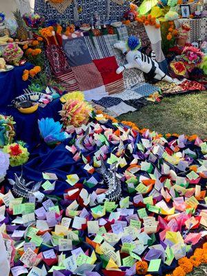 Paper boat altar to honor matriarchs, I added my grandmothers name.