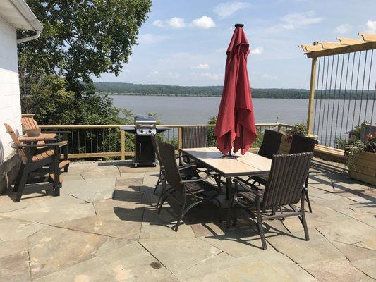 Custom fieldstone patio with custom privacy screen & railings overlooking the Hudson in Glasco, NY