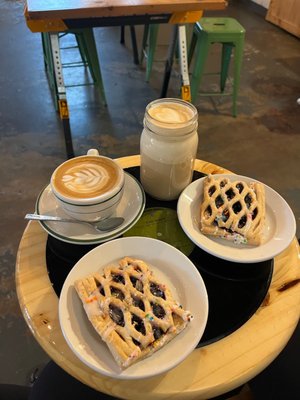 Pop-tarts, cappuccino and a latte