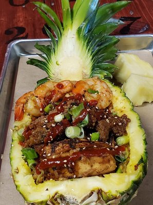 Terikayi Pineapple Bowls. Asian Rice loaded with Chicken, Steak, and Shrimp.