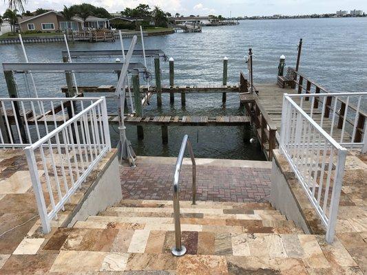 Travertine stairs leading to boat dock