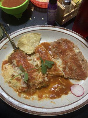 To the right of the chili relleno is the cheese enchilada and frijoles. Delicious!