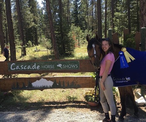 Me with lesson horse, finesse, at the cascade horse show. We won champion in the .90 meter children jumpers.