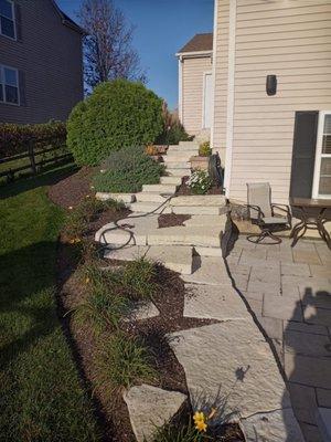 Mulch installation, sidewalk and steps