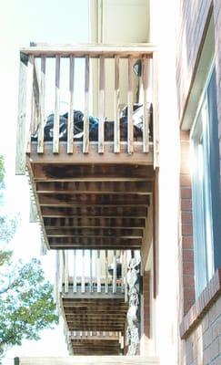 Trash piled high on the balcony.