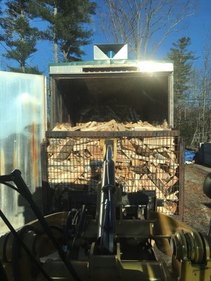 Wood coming out of 1 of our firewood kilns