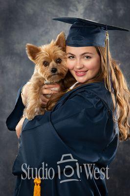 Senior with dog in studio.