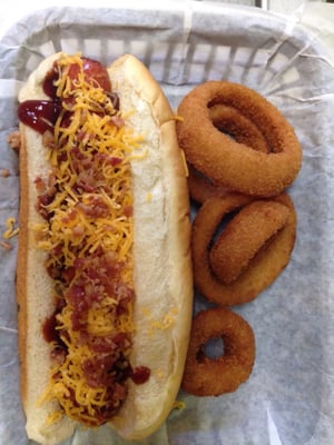 One of our gourmet hot dogs with a side of onion rings.