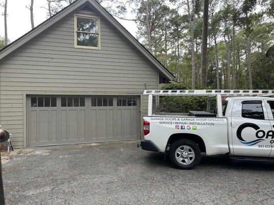 The replacement for the 40 old wooden garage door in ship yard plantation is a CHI model 5334
Sandstone in color with Madison window design