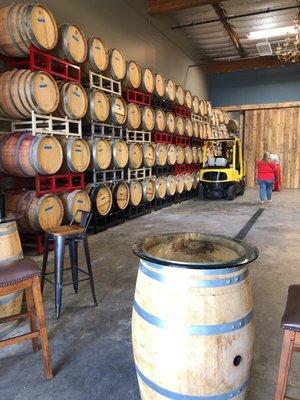 The tasting room leads into the barrel room!