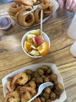 Fried shrimp, okra and fresh fruit.