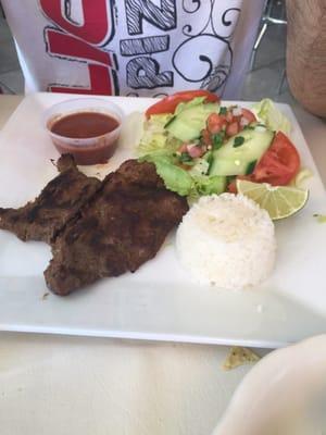 steak skirt and rice with salad