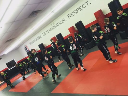 Our black belt club, applying their skills in sparring. Learning self defense standing and on the ground with grappling.