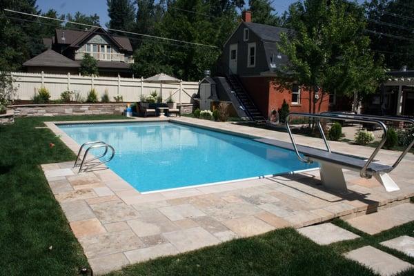 Custom swimming pool with natural stone coping and decking - Private Residence- Boulder, CO